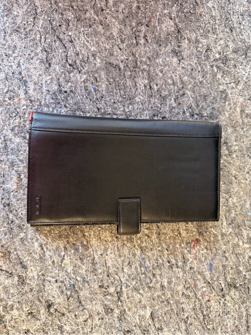 Tumi Black Leather Long Wallet with Red Accent